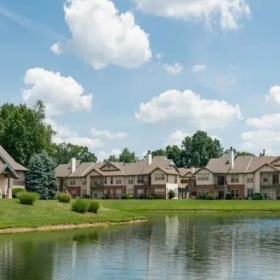 Apartment buildings with a pond